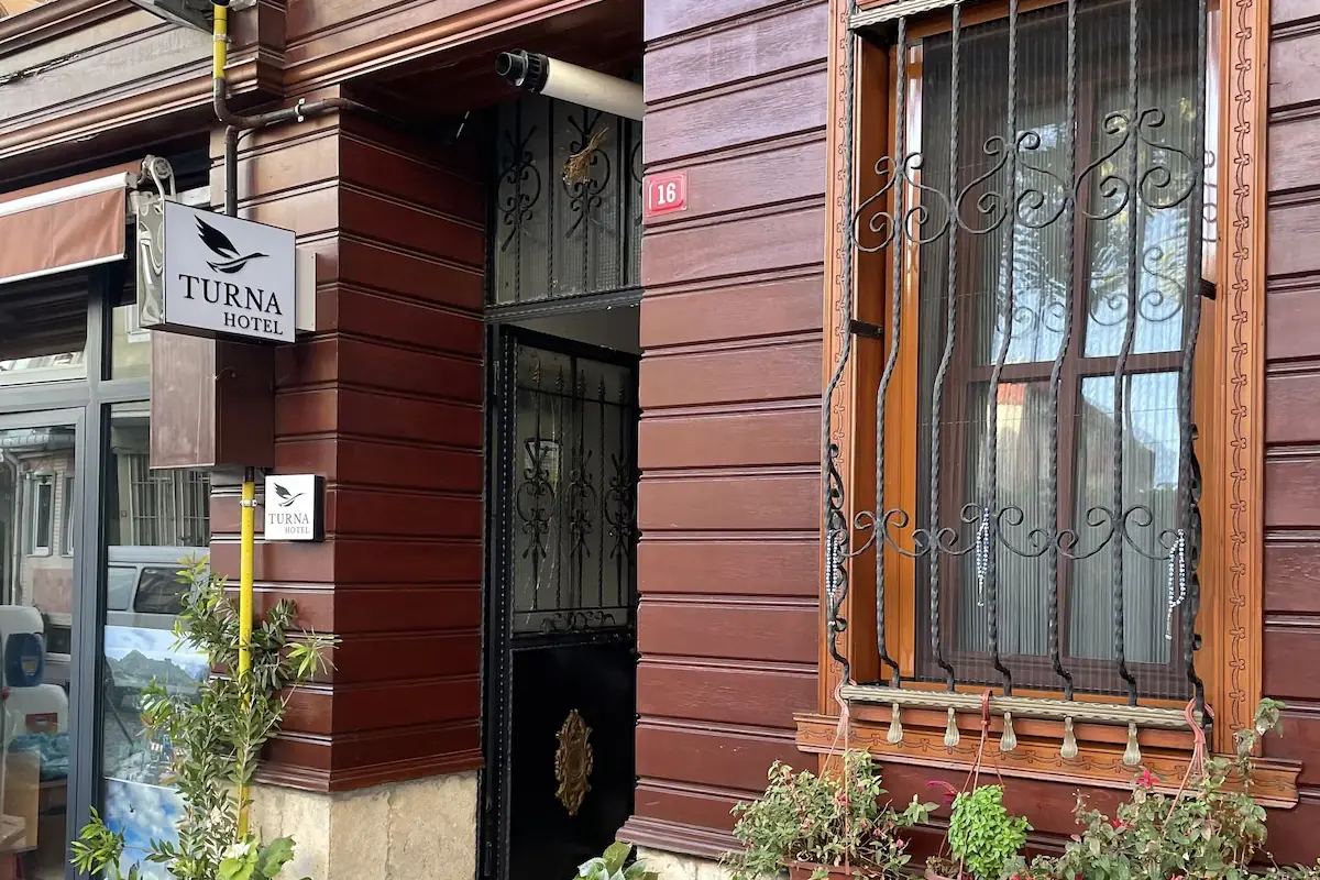 Turna Hotel's wood façade, sign and front door on Küçük Ayasofya
